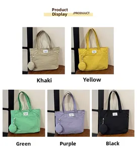 Detailed grid of canvas tote bags in khaki, yellow, green, purple and black with small pouches