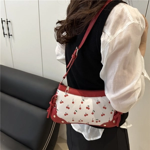 White canvas shoulder bag with red cherry print and leather trim, stylish summer crossbody