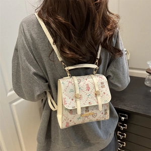 Mini white leather backpack with pink bows, bears, and floral patterns for women