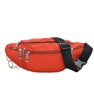 Minimalist orange multi-pocket crossbody waist bag with adjustable strap and metal chain