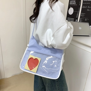 Light purple transparent crossbody bag with heart detail for casual summer fashion