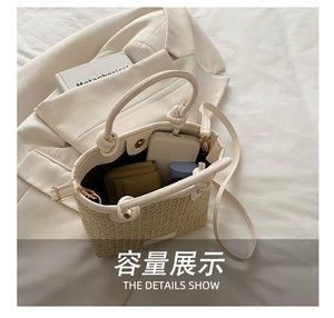 Detail of the woven bucket bag interior showing spacious storage for phone and lipstick