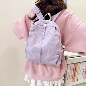 Minimalist light purple travel backpack in lightweight nylon with aesthetic Korean style