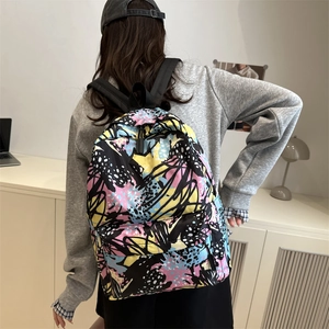 Sac à dos décontracté avec imprimé graffiti coloré et blocs de couleurs abstraits pour étudiants