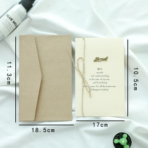 Retro kraft envelope with Love metal charm and twine bow for Father's Day or birthday
