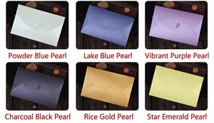 Detailed view of pearlescent envelopes in six colors with heart-shaped buckle closures