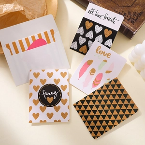 Minimalist stationery greeting card set with envelopes and gold glitter heart patterns