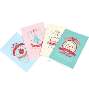 Set of four minimalist Christmas greeting cards with festive illustrations and envelopes