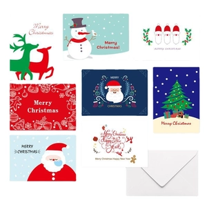 Set of 8 festive Christmas cards with Santa and Reindeer designs and white envelopes