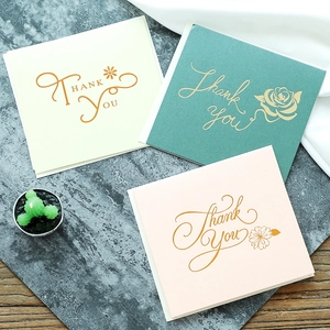 Three-piece square Thank You card set in beige, green, and pink with floral designs