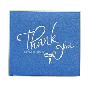 Square navy blue greeting card with white Thank You script and elegant ribbon bow design