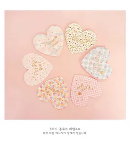 Set of six heart-shaped cards with floral and checkered patterns for gift messages