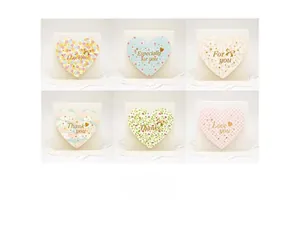 Detail of 6 assorted heart-shaped greeting cards with gold foil greetings and floral patterns