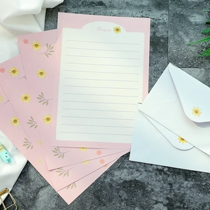 Floral stationery set with pink daisy letter paper and matching white envelopes