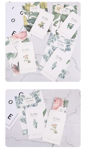 Detail view of vintage botanical stationery set featuring hand-drawn floral patterns