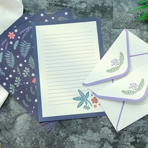 Floral stationery set with ivory ruled paper and vintage aesthetic botanical envelopes