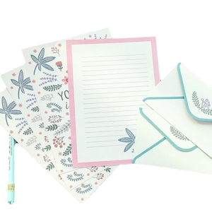 Floral botanical stationery set with romantic envelopes and matching mint green pen