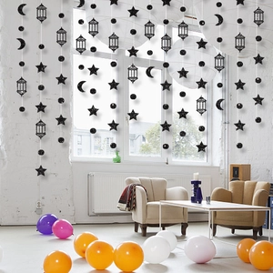 Black glitter hanging garland with stars moon and lanterns for festive party decoration