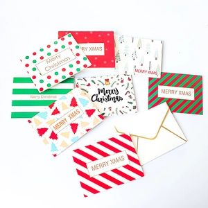Set of 7 colorful Merry Christmas greeting cards with various festive patterns and envelopes