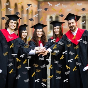 Gold, silver, and black glitter graduation confetti with Congrats GRAD and cap shapes