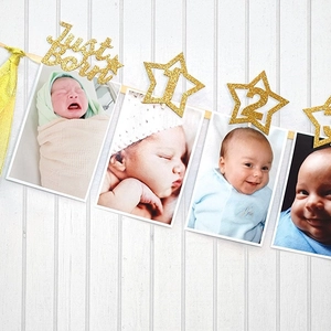 Golden glitter first birthday banner with 12 photo clips for baby monthly photo display