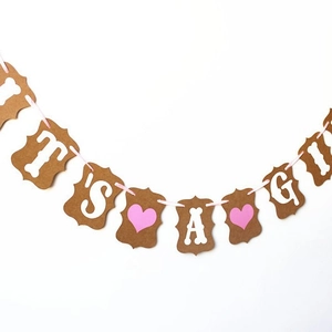 It's a Girl banner with kraft paper cards and pink ribbon for baby shower decor
