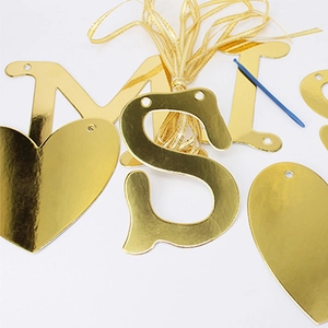 Gold mirror Miss to Mrs wedding banner with heart cards, ribbon and threading needle