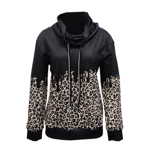 Close-up of leopard print patchwork and adjustable drawstring on casual pullover