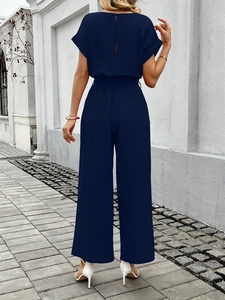 Short sleeve dark blue wide leg jumpsuit with waist tie and back slit detail