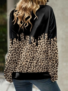 Women's leopard print patchwork hoodie with unique ink drip design seen from the back