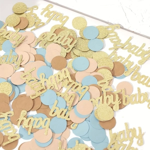 Glittery gold baby confetti with colorful blue pink and kraft round paper for party decor
