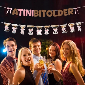 A Tini Bit Older feestslinger met martini glas uitsparingen en roze strikjes