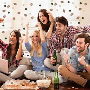 Vibrant football party confetti with green, beige round discs and brown rugby shapes