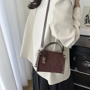 Chic mocha brown quilted crossbody bag in suede and leather for women's autumn fashion
