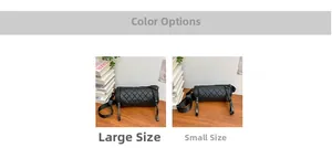 Size comparison of large and small black quilted nylon barrel bags on wooden desk