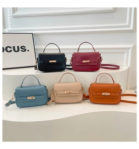 Five elegant handbags in black, red, blue, beige, and orange with gold metal locks