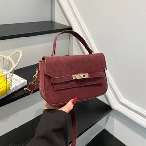 Elegant wine red leopard pattern handbag with gold twist lock and adjustable strap