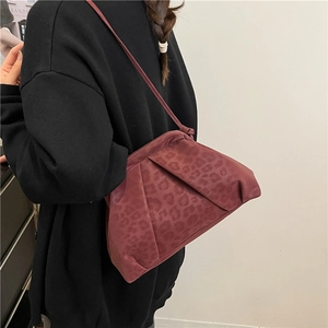 Burgundy leopard print shoulder bag with chic cloud-pleated design and matte finish