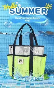 Close-up of green mesh beach tote bag with BEEN LOVE logo against pool background
