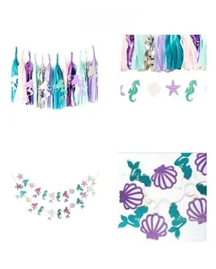 Détail de bannières sirène pailletées et de pompons en papier colorés pour décoration
