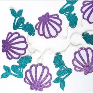 Banderole sirène pailletée bleu sarcelle et coquillages violets pour décoration