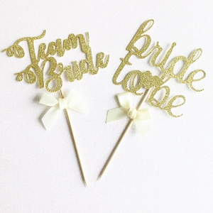 Pics à gâteau dorés Bride to Be et Team Bride avec nœuds blancs pour mariage