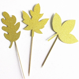 Golden glitter maple and oak leaf cake toppers for Thanksgiving party and holiday desserts