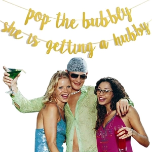 Gold glitter Pop the Bubbly banner for bachelorette and engagement party decoration