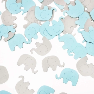 Close-up of light blue and grey elephant paper confetti for baby shower table decoration