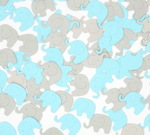 Blue and grey elephant confetti scattered for baby shower party table decoration