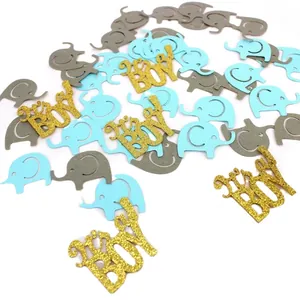 Elephant boy baby shower table confetti with blue elephants and gold glitter it's a BOY text