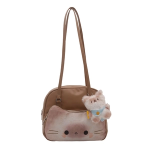 Chic tan shoulder bag with cute cat face design and matching animal plush keychain