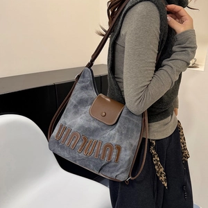 Retro canvas hobo bag in grey-blue with brown leather flap and Miu Miu style embroidery