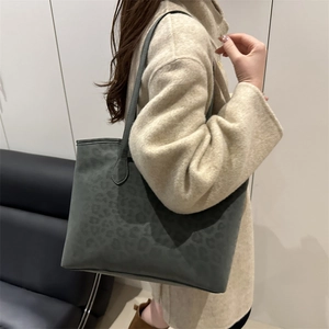 Chic leopard print tote bag in dark grey-green suede texture for winter fashion